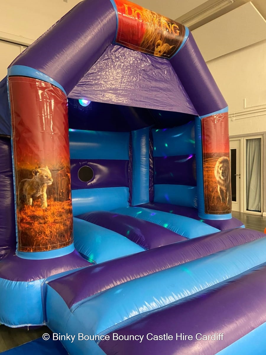 Lion King Theme Mini Disco Bouncy Castle Bouncy Castle Hire and soft play hire in Cardiff in